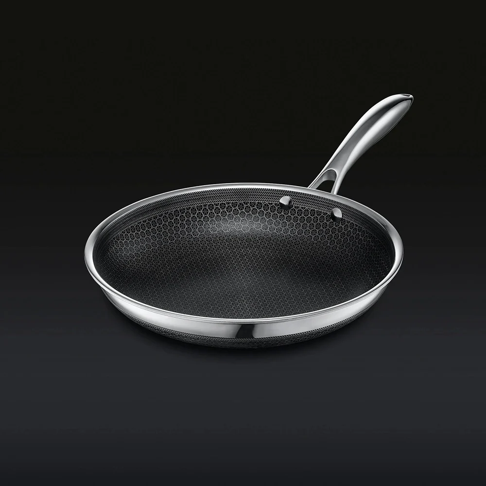 HexClad 12-inch Hybrid frying pan with laser-etched hexagonal stainless steel and nonstick coating surface